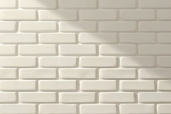 A White Brick Wall with Shadows
